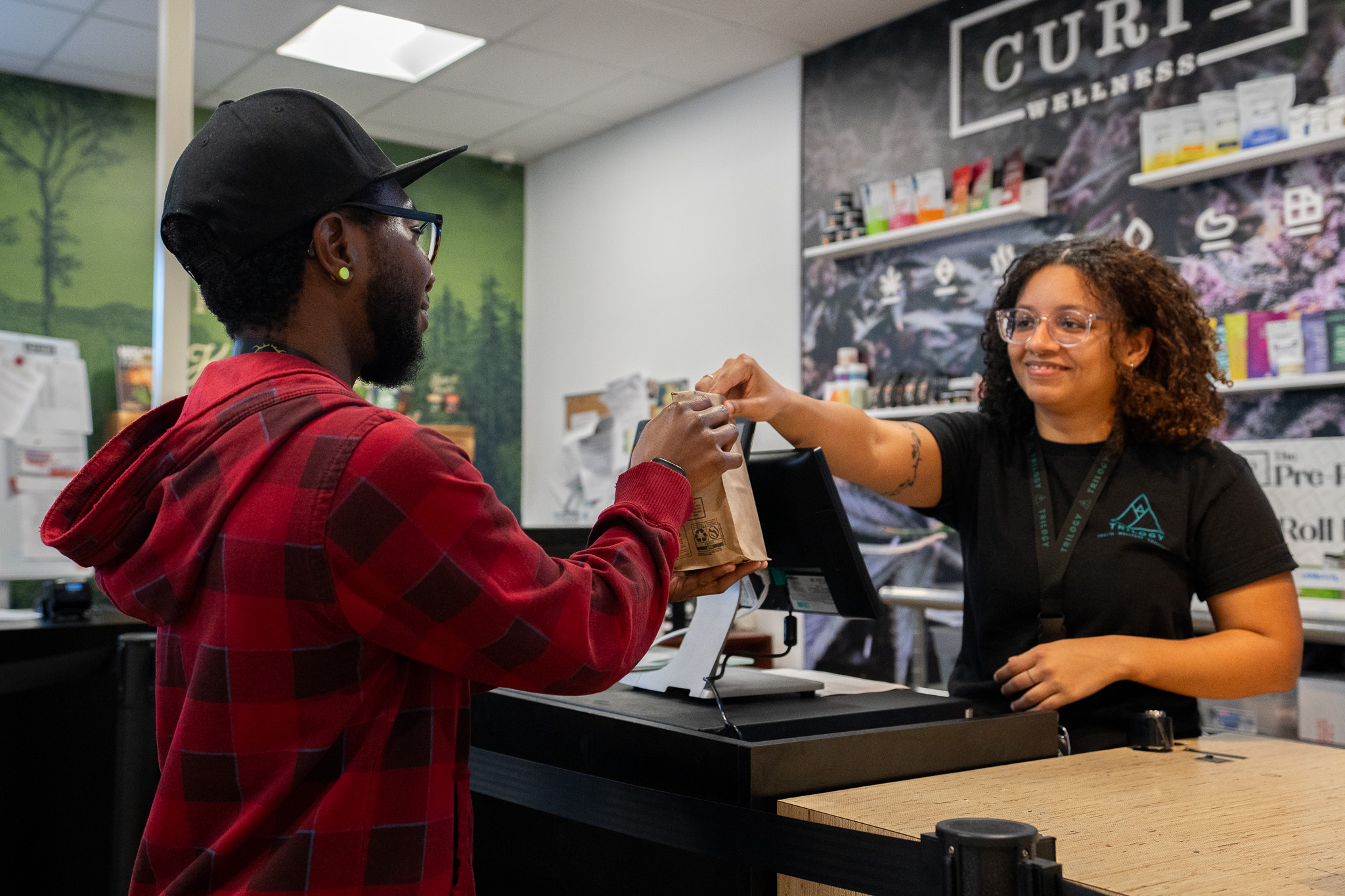 Medical cannabis patient being helped by a wellness advisor